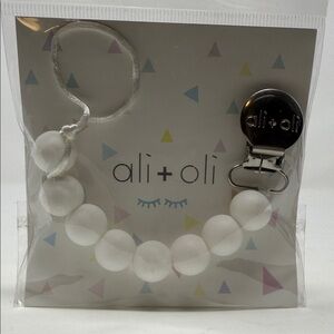 ali + oli White Pacifier Clip baby